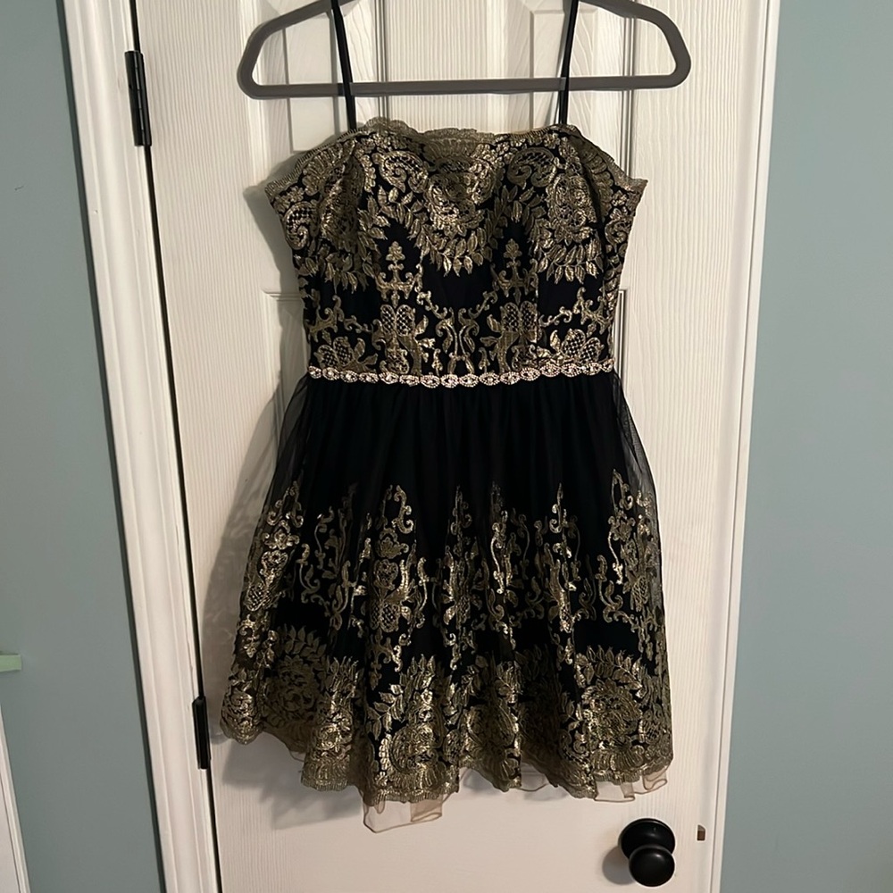 Jodi Kristopher black and gold elegant winter formal dress